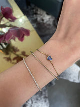 Blue Sapphire Heart Bangle 18k gold Stackable design on model