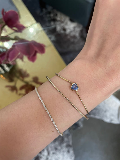 Blue Sapphire Heart Bangle 18k gold Stackable design on model