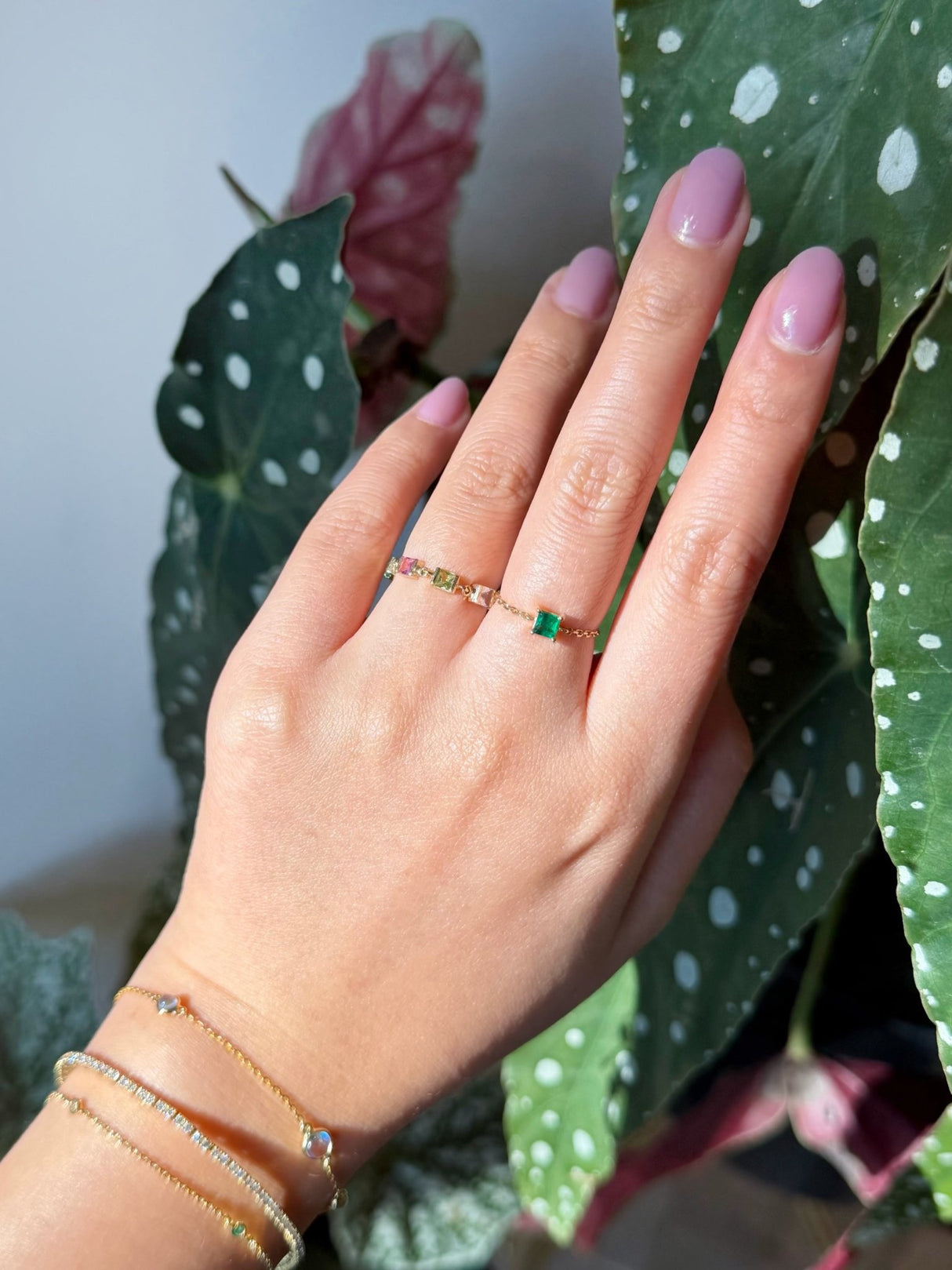 Brazilian Emerald Chain Ring 18K gold stackable ring on model