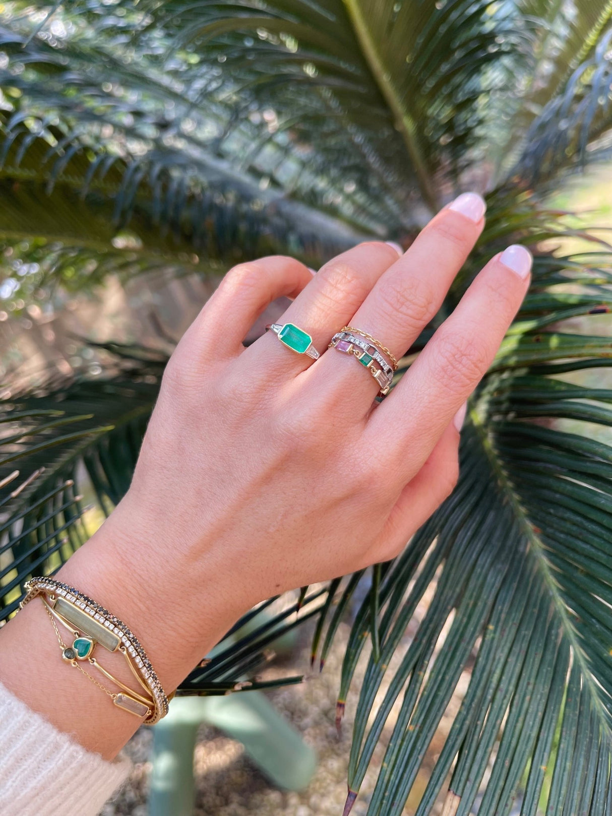 Brazilian Emerald & Diamond East West Ring 18k gold engagement ring on model