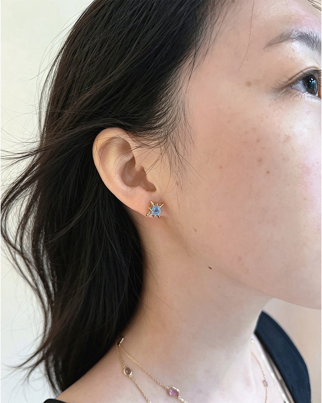 Ceylon_Sapphire_Starburst_earrings_18K_gold_handmade_fine_jewelry_on_model_2
