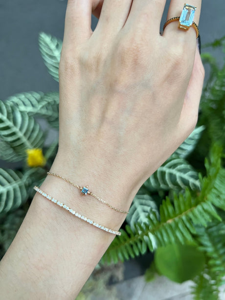 December Birthstone Topaz Bracelet 14k gold stackable design on model