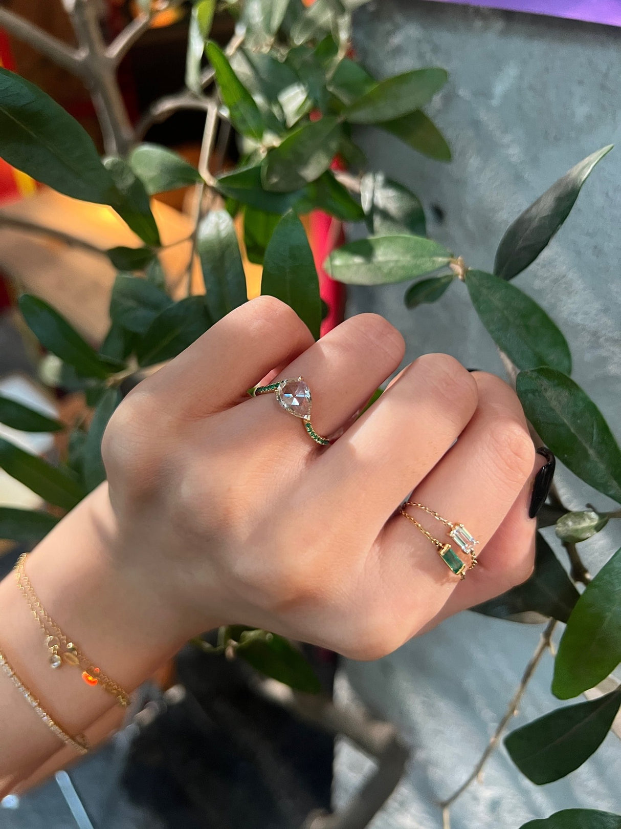 Diamond & Emerald Curvature Supreme Ring 18k gold engagement ring on model