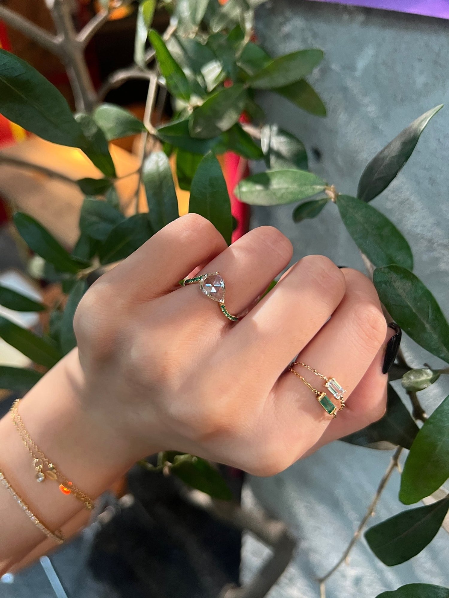 Diamond & Emerald Curvature Supreme Ring 18k gold engagement ring on model