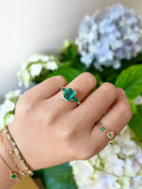 Emerald Bar Ring 18k gold engagement ring on model 