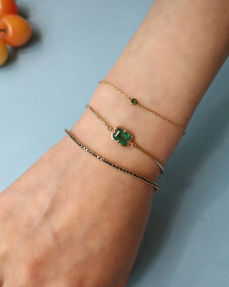 Emerald_Compass_Bangle_18K_gold_stackable_design_on_model_2