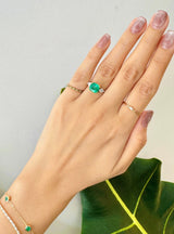 Emerald & Diamond Everlasting Ring 18k gold engagement ring on model