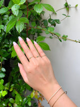 Emerald & Diamond Infinite Ring 18k gold stackable ring on model 4