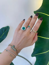 Emerald & Diamond Isis Ring 18k gold engagement ring on model