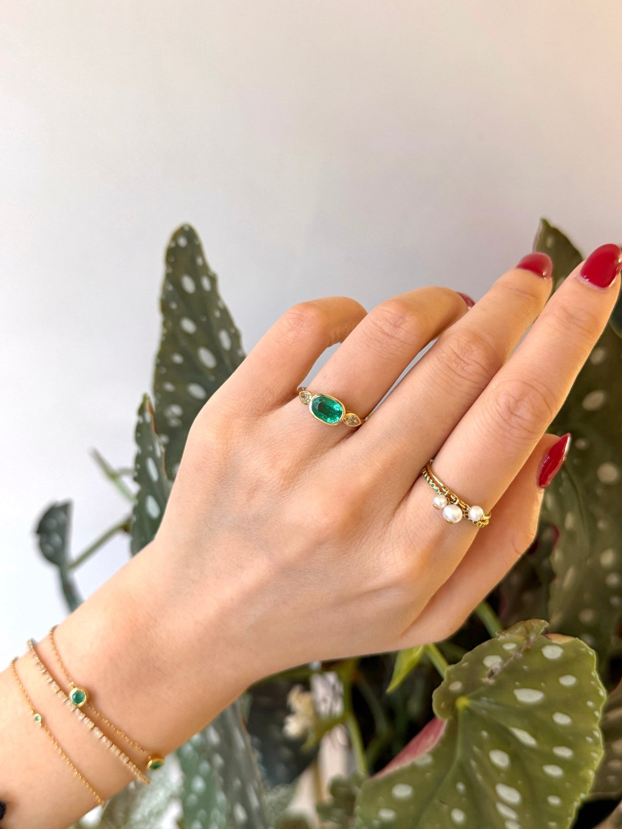 Emerald_Diamond_Ring_18K_gold_engagement_ring on model 2