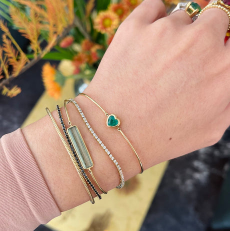 Emerald Heart Bangle 18k gold stackable design on model
