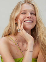 Emerald Petite Button handmade Necklace in 18k gold on model 3