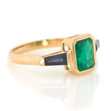 Emerald & Royal Blue Sapphire Eternal Ring 18k gold engagement ring side view