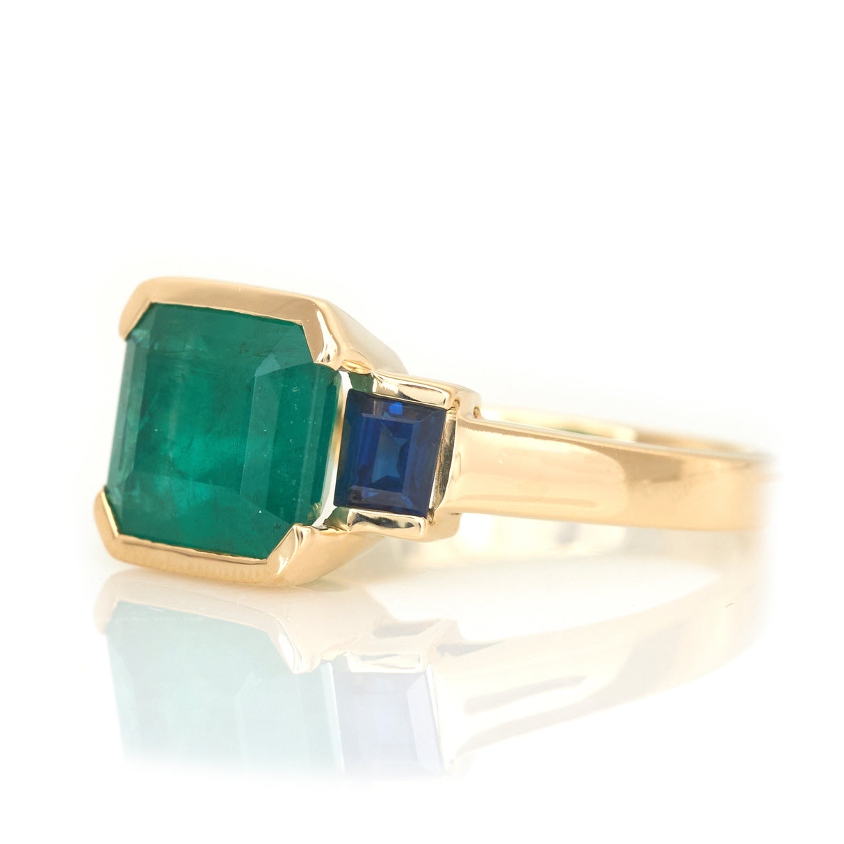 Emerald & Sapphire Tonal Deco Bar Spring Ring 18k gold engagement ring side view
