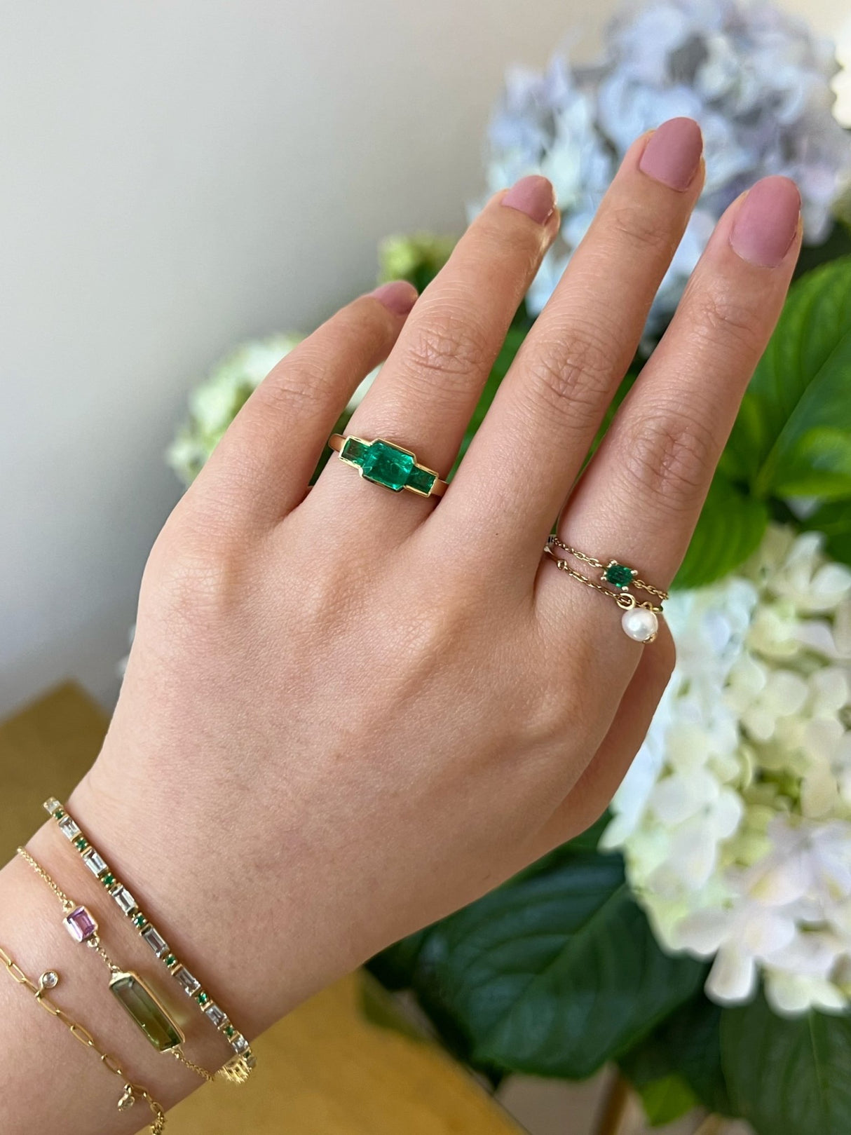 Emerald Tonal Deco Ring 18k gold engagement ring on model