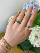 Emerald Tonal Deco Ring 18k gold engagement ring on model