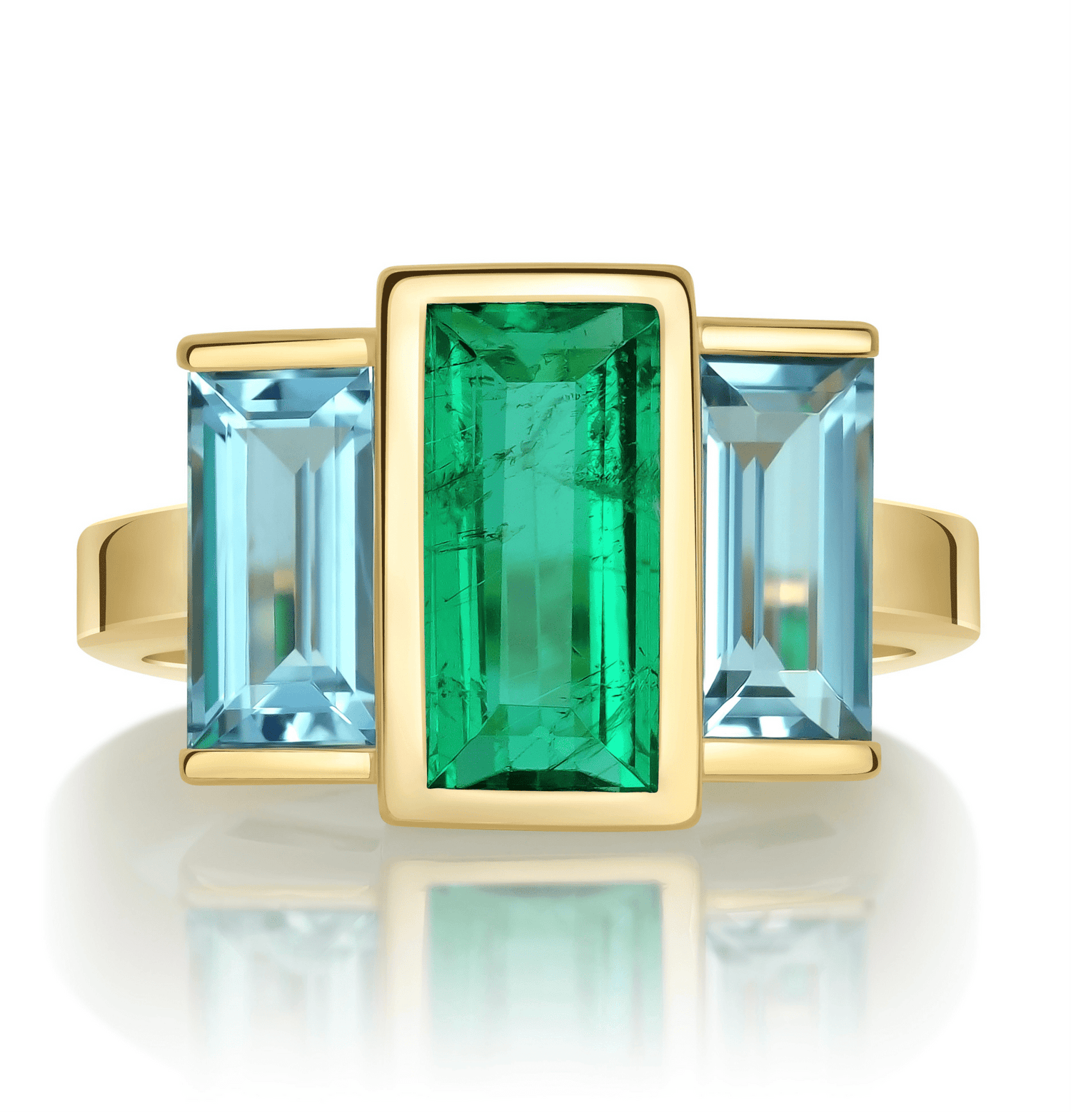 Exquisite handcrafted 18k ring by female artisans in our Bangkok studio. Vivid green emerald paired with aquamarines from Madagascar and emeralds from Gemfields. Sustainably sourced and adds just the right pop of color. 
