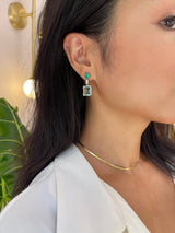 Emerald & Aquamarine Spring’s Dewdrop Earrings. Exquisite handcrafted 18k earrings by female artisans in our Bangkok studio. Vivid green emerald paired with aquamarines from Madagascar and emeralds from Gemfields. Sustainably sourced and adds just the right pop of color. 