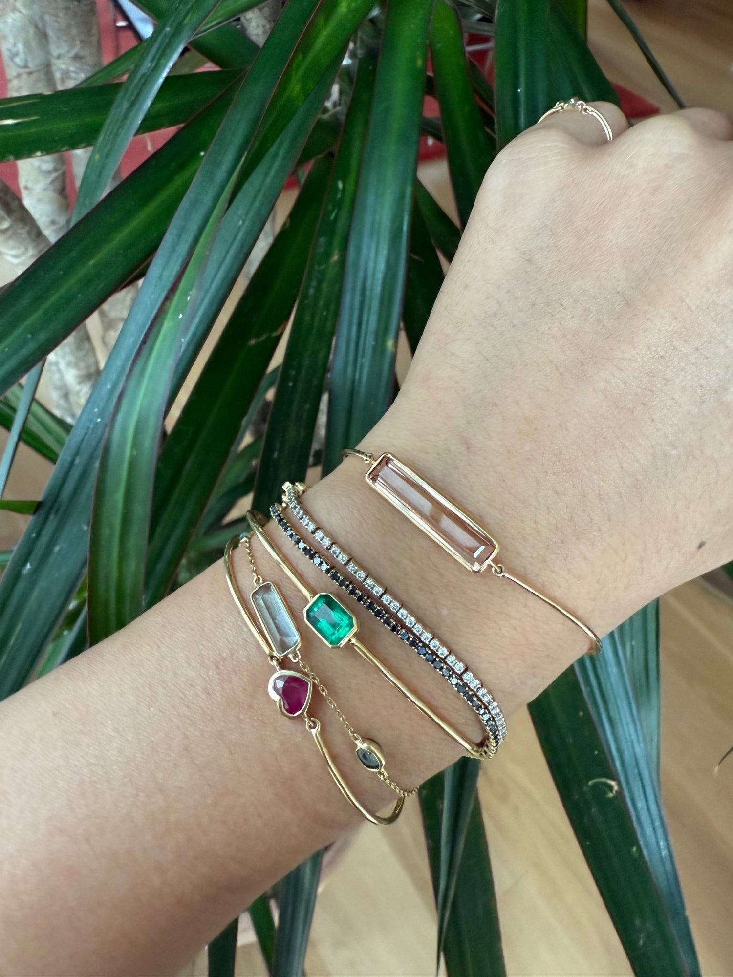 Emerald linear bangle 18k gold Stackable design on hand