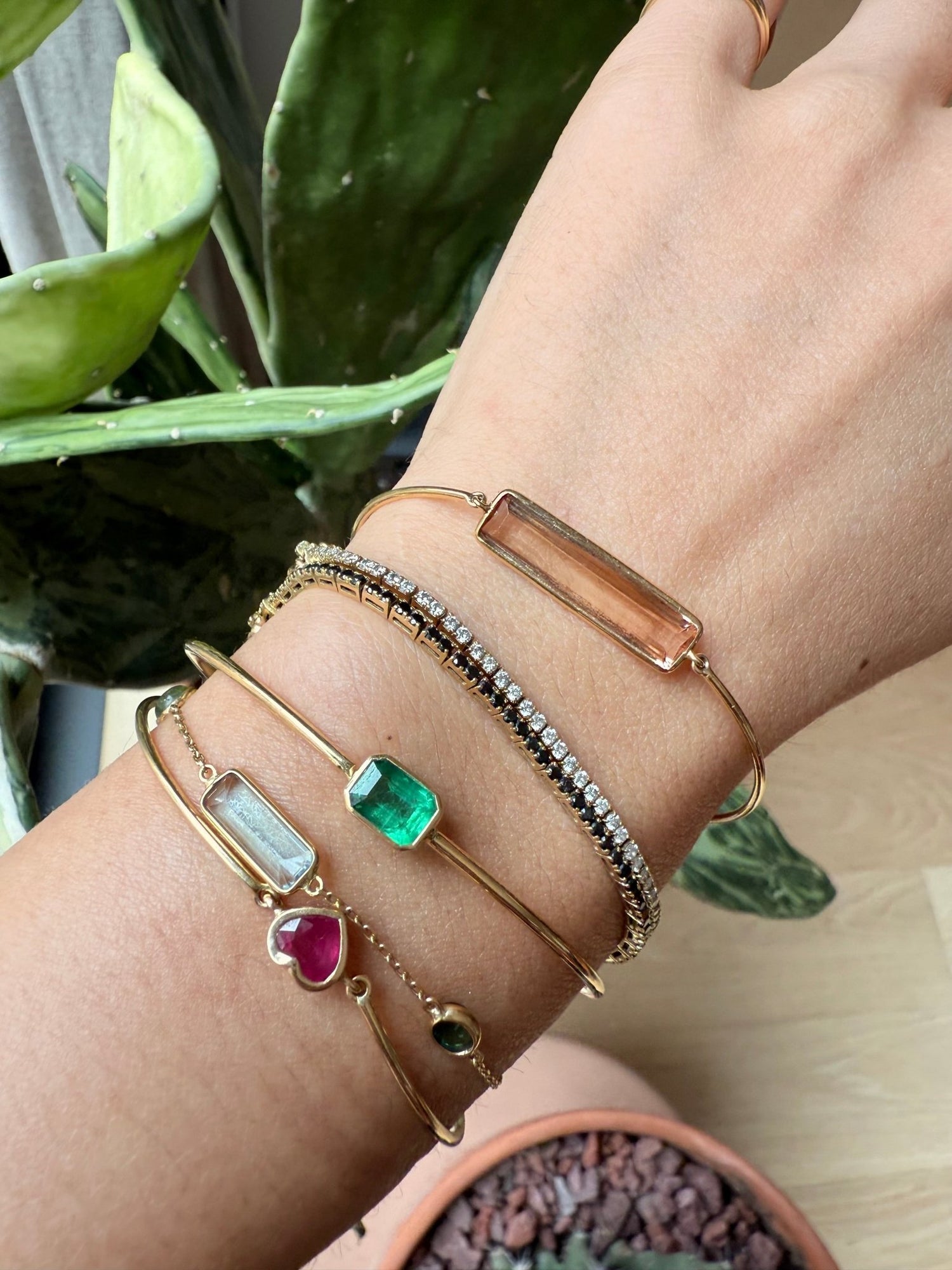 Emerald linear bangle 18k gold Stackable design on model