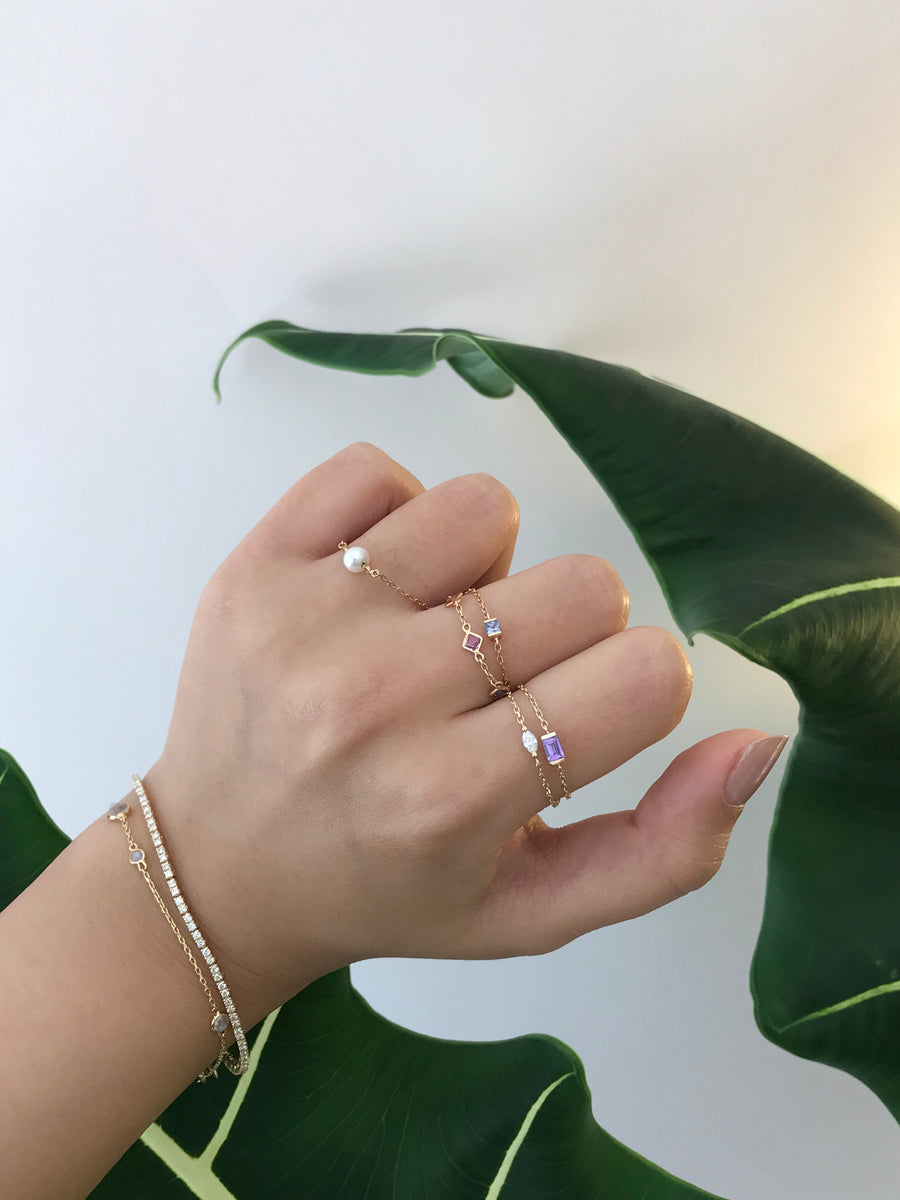 Purple sapphire baguette chain ring