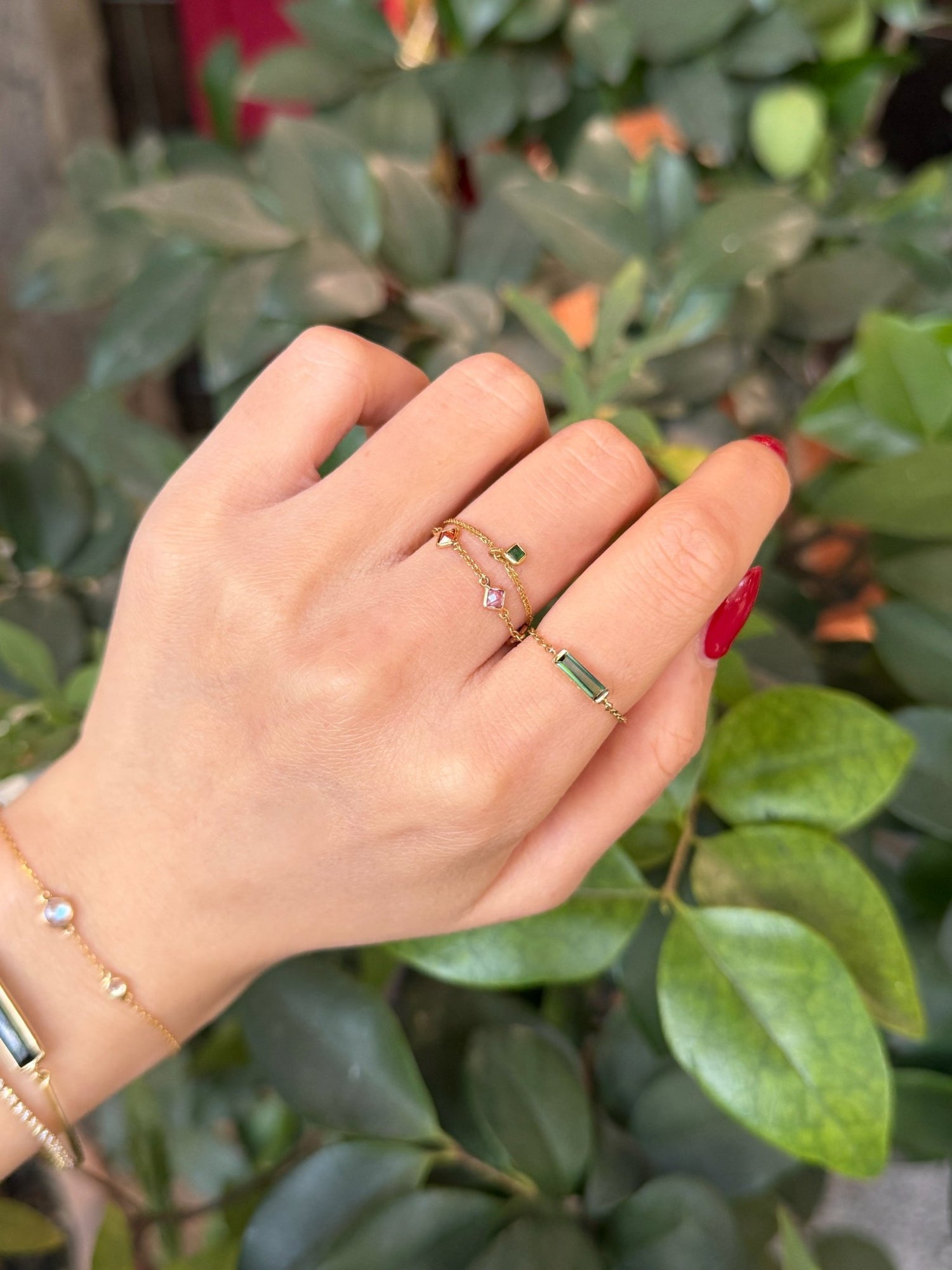 Green Tourmaline Slim Bar chain ring 14K gold stackable design on model 2