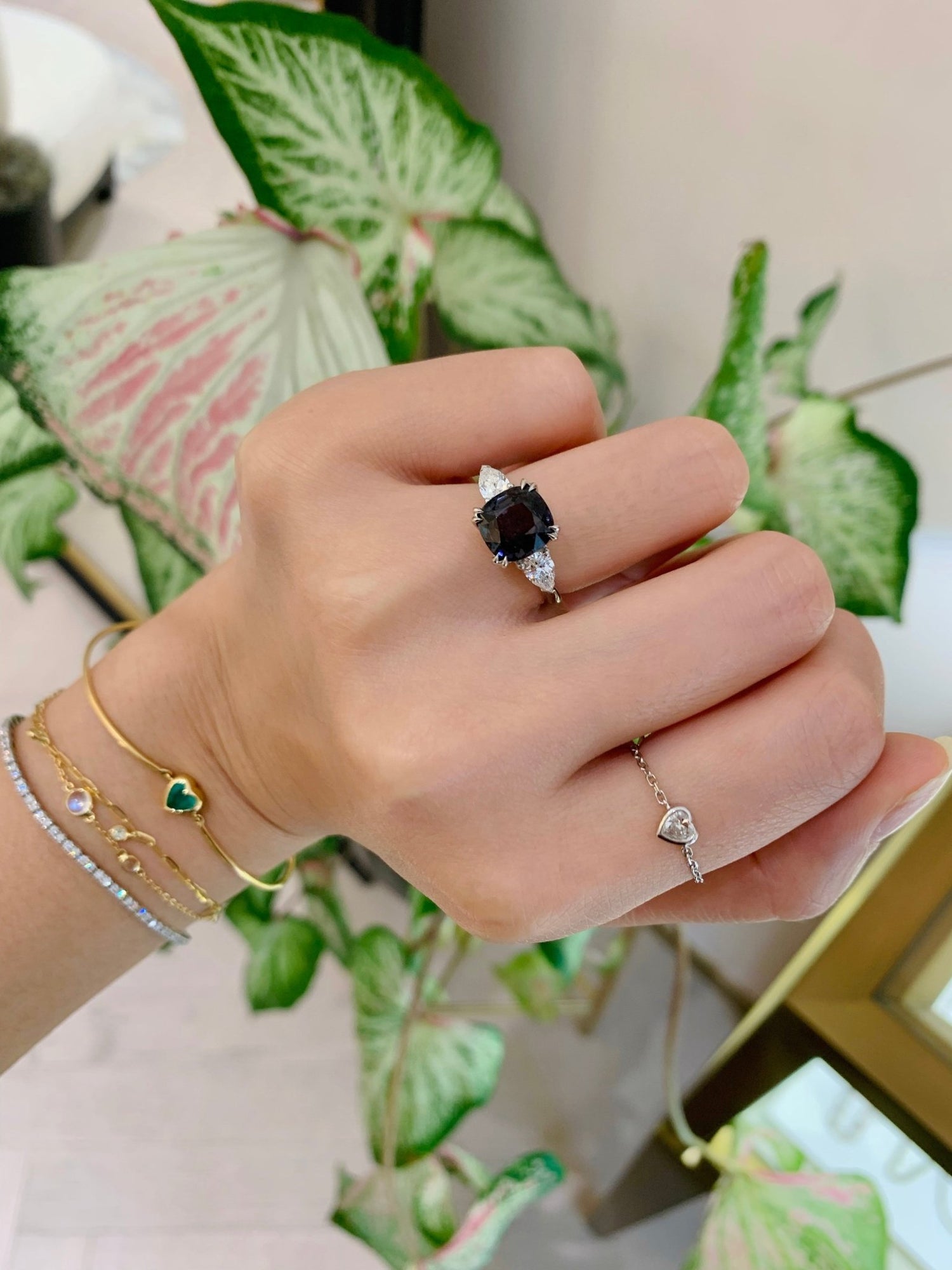 Grey Spinel & Diamond Forever Love Ring 18k gold engagement ring on model 