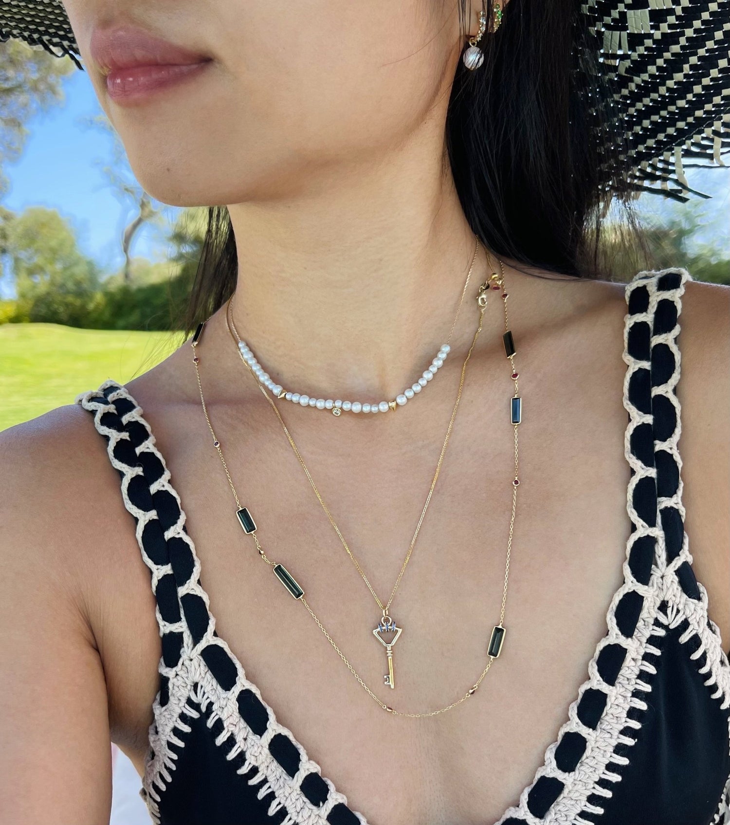 Indicolite & Ruby Candy Bar Necklace 18k handmade fine jewelry on model