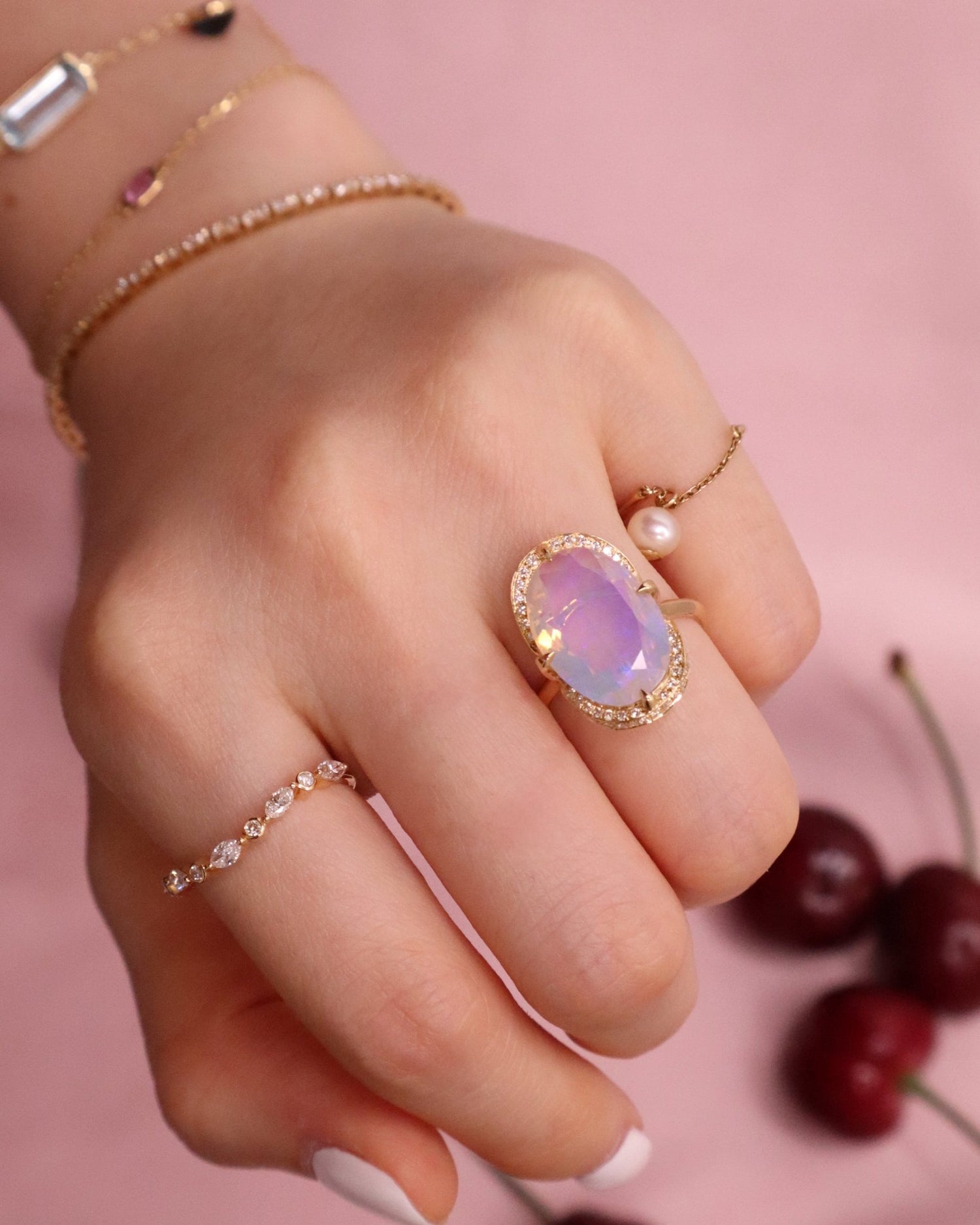 Jelly_Opal_Aurora_Ring_18K_gold_engagement_ring_on_model_4