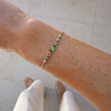 Lagoon Tourmaline,Spinel & Diamond Compass Bangle 18k gold Stackable design on model