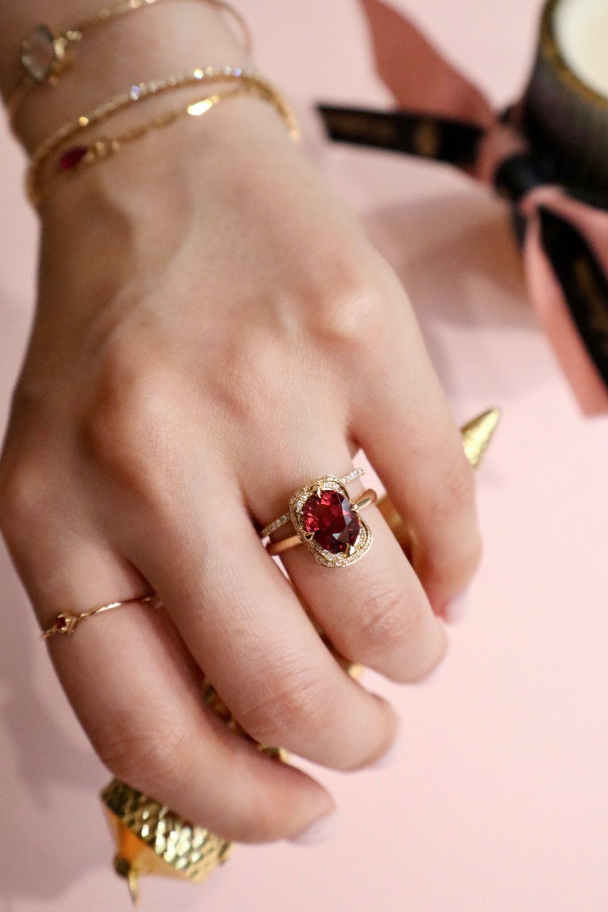 Malaya Garnet Aurora Ring 18k gold engagement ring on model