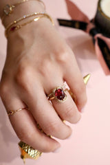 Malaya Garnet Aurora Ring 18k gold engagement ring on model