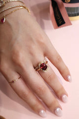 Malaya Garnet Aurora Ring 18k gold engagement ring on model 2