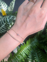 March Birthstone Aquamarine Bracelet 14k gold stackable design on model