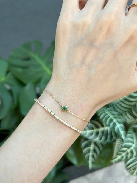 May Birthstone Emerald Bracelet 14k gold stackable design on model