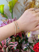 Opal Dot Bracelet 18k gold stackable design on model