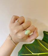 Opal & Tsavorite Gaia Ring 18k gold engagement ring on model