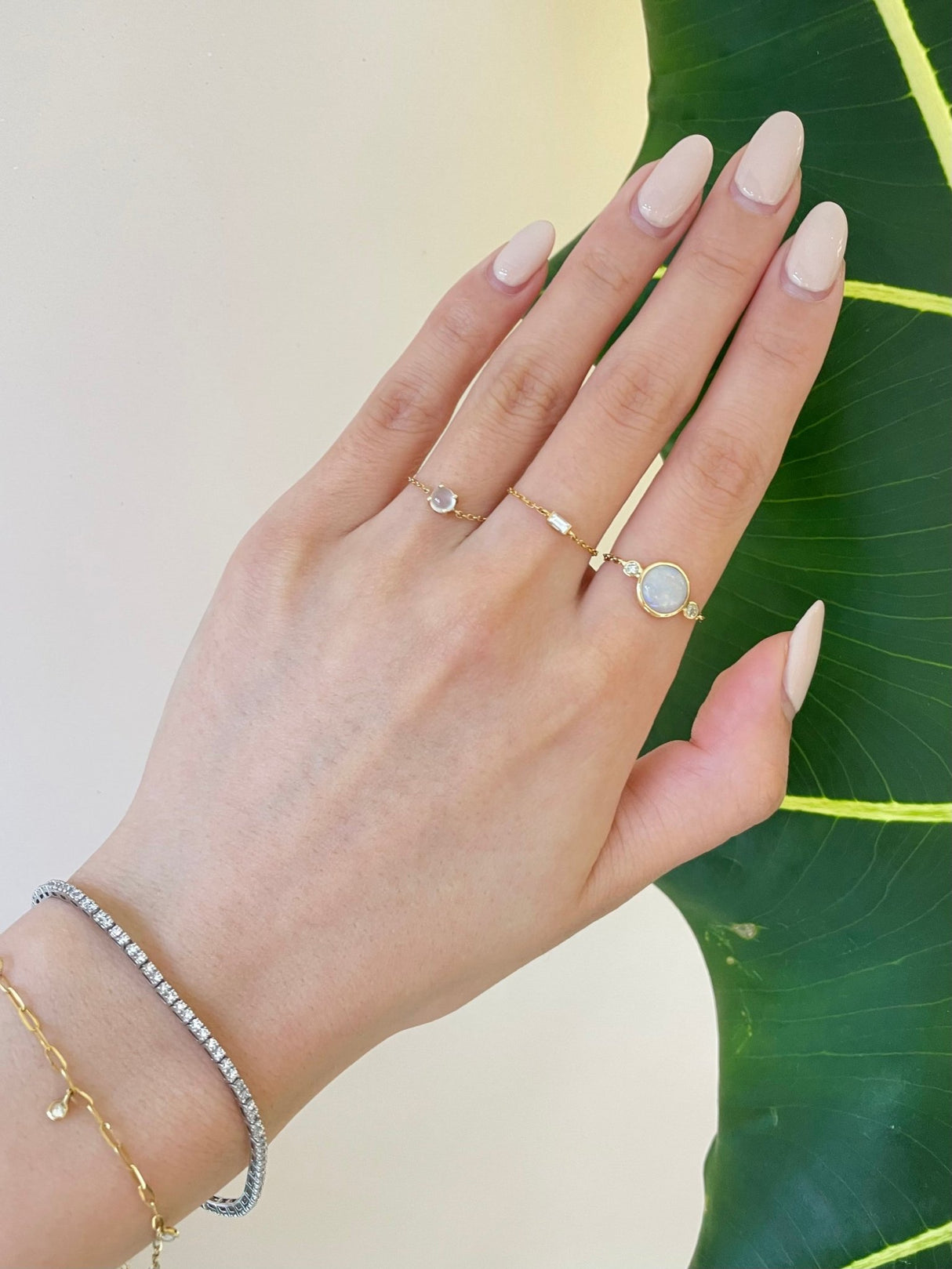 Opal and Diamond Eos Chain Ring 18k gold Stackable ring on model