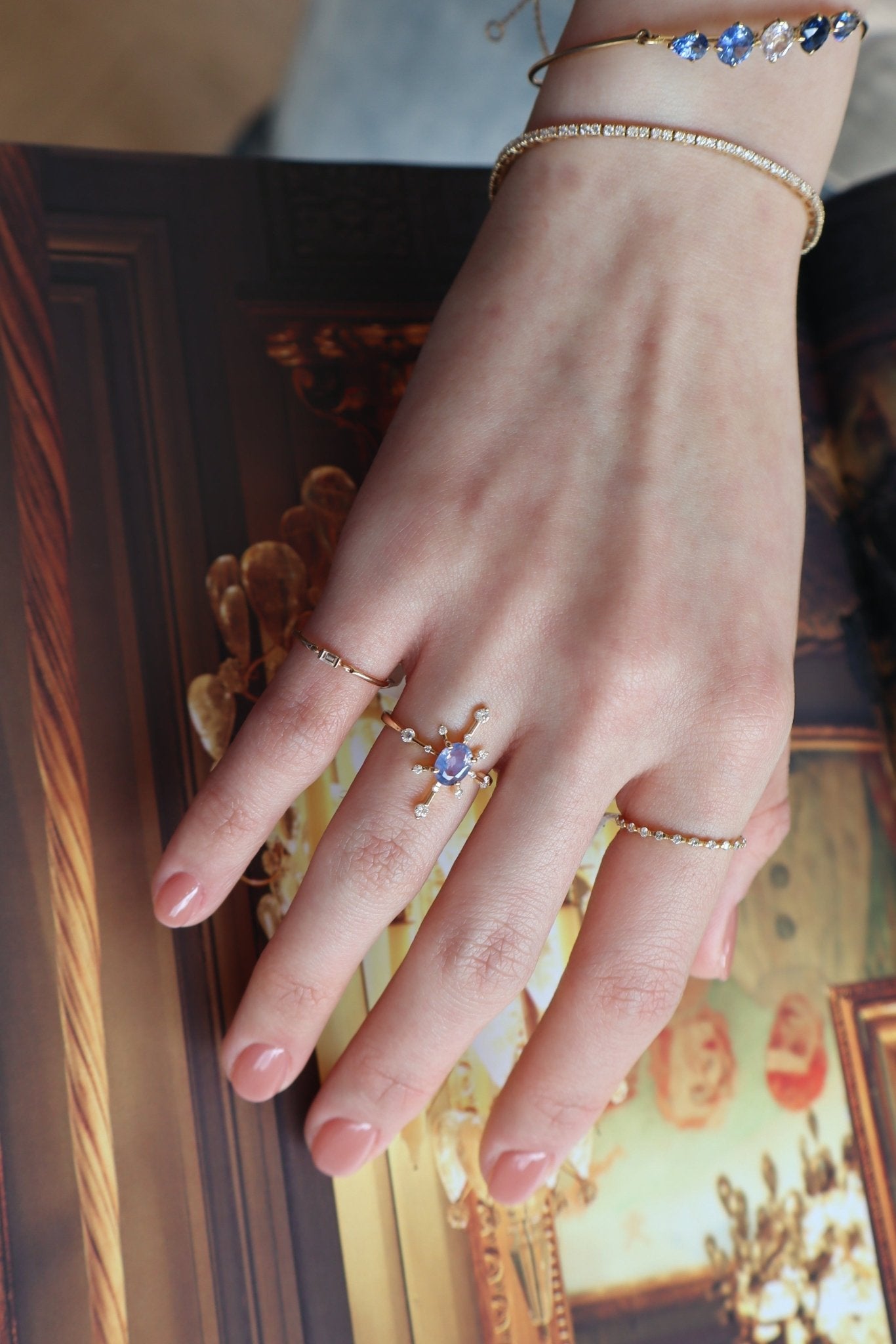 Opalescent_Lilac_Sapphire_Starburst_Ring_18K_gold_stackable_ring on model