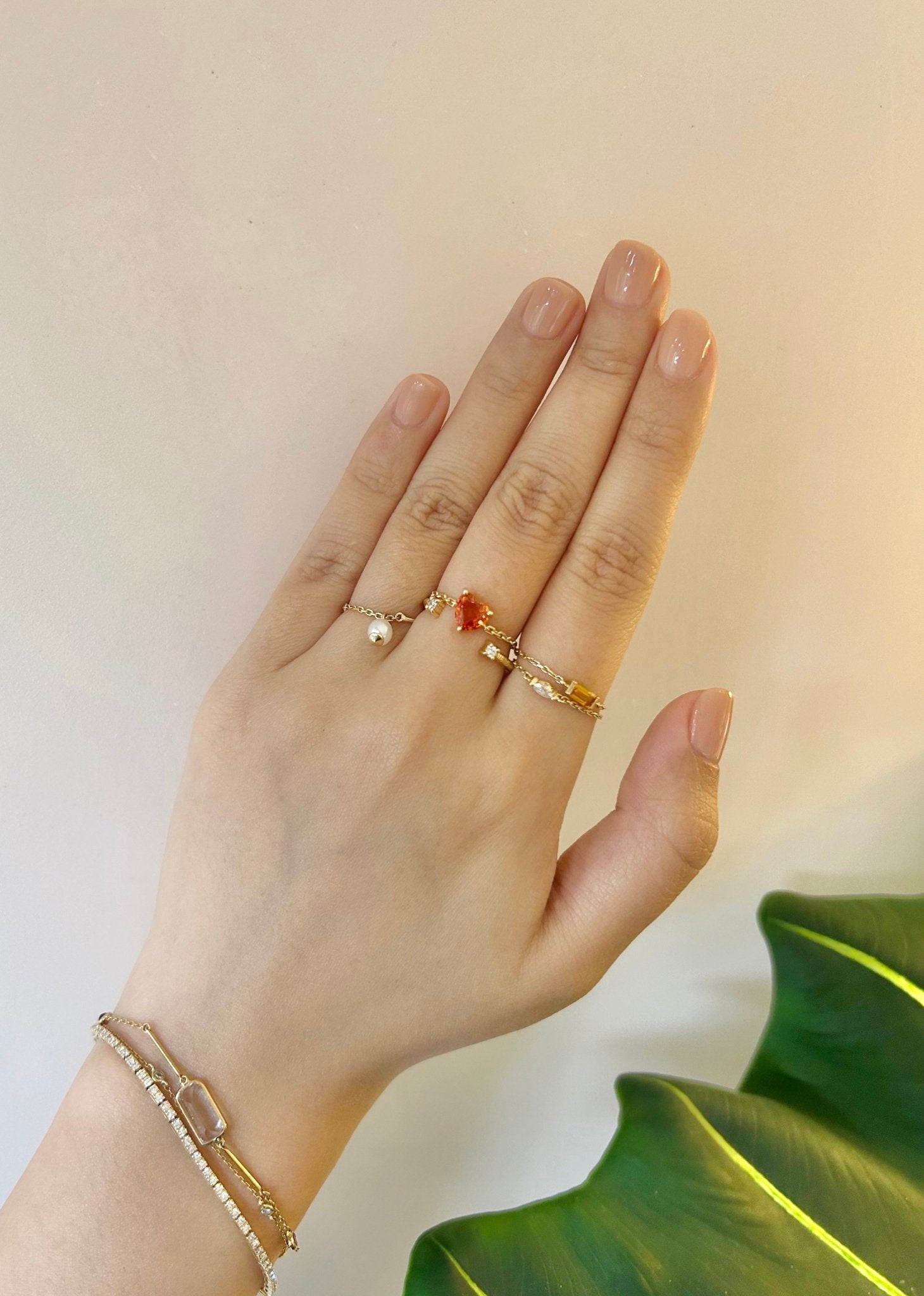 Orange Sapphire Heart Supreme Chain Ring 18k gold Stackable ring on model