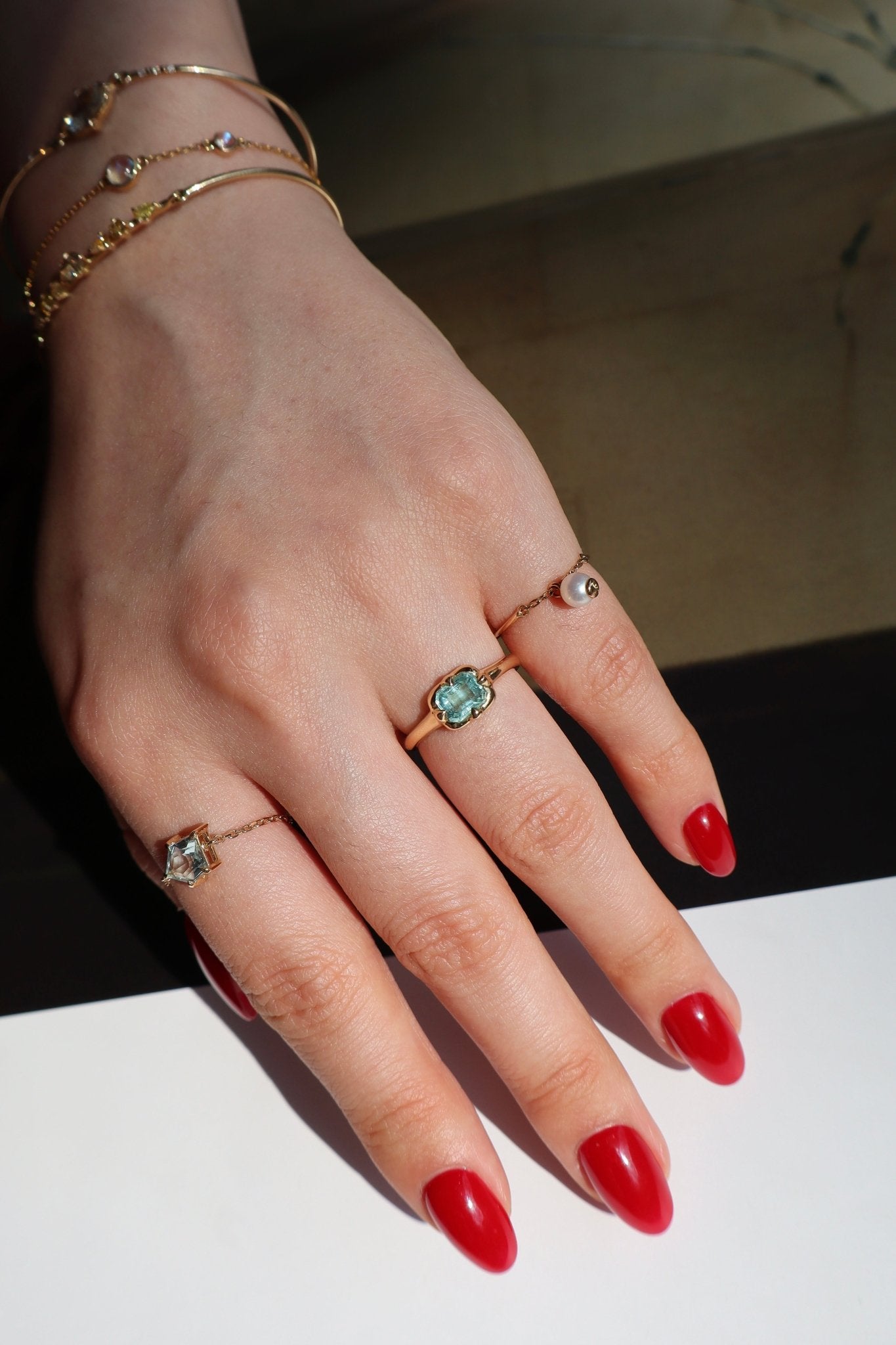 Paraiba Tourmaline Compass Ring 18K engagement ring on model 1