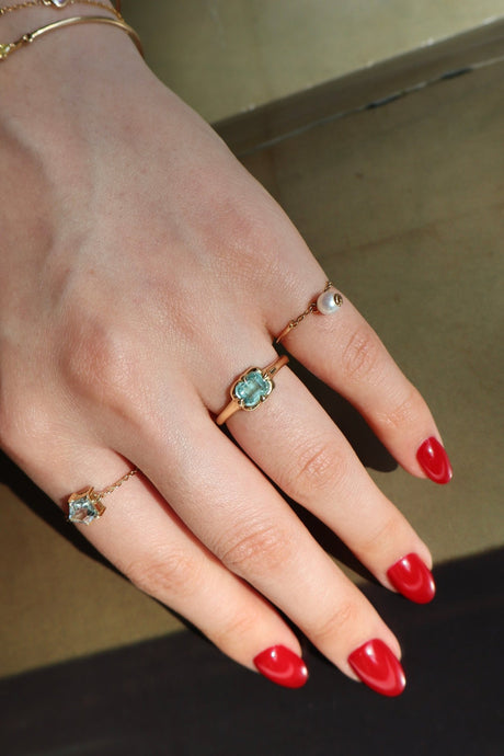 Paraiba Tourmaline Compass Ring 18k gold stackable ring on model