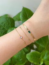 Petite Diamond & Emerald Dot Bracelet 18k gold stackable design on model