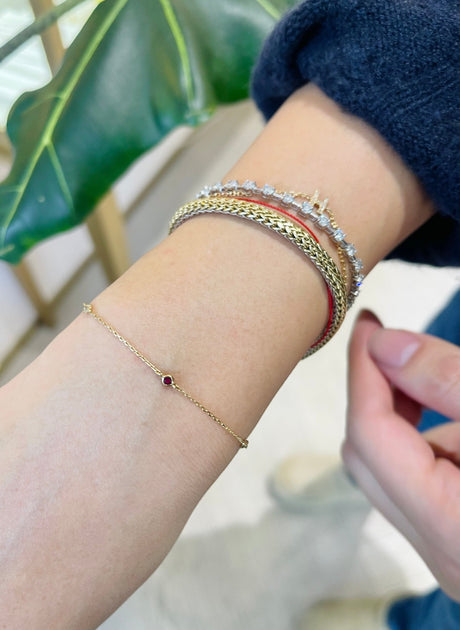 Petite Diamond & Ruby Dot Bracelet 18k gold stackable design on model