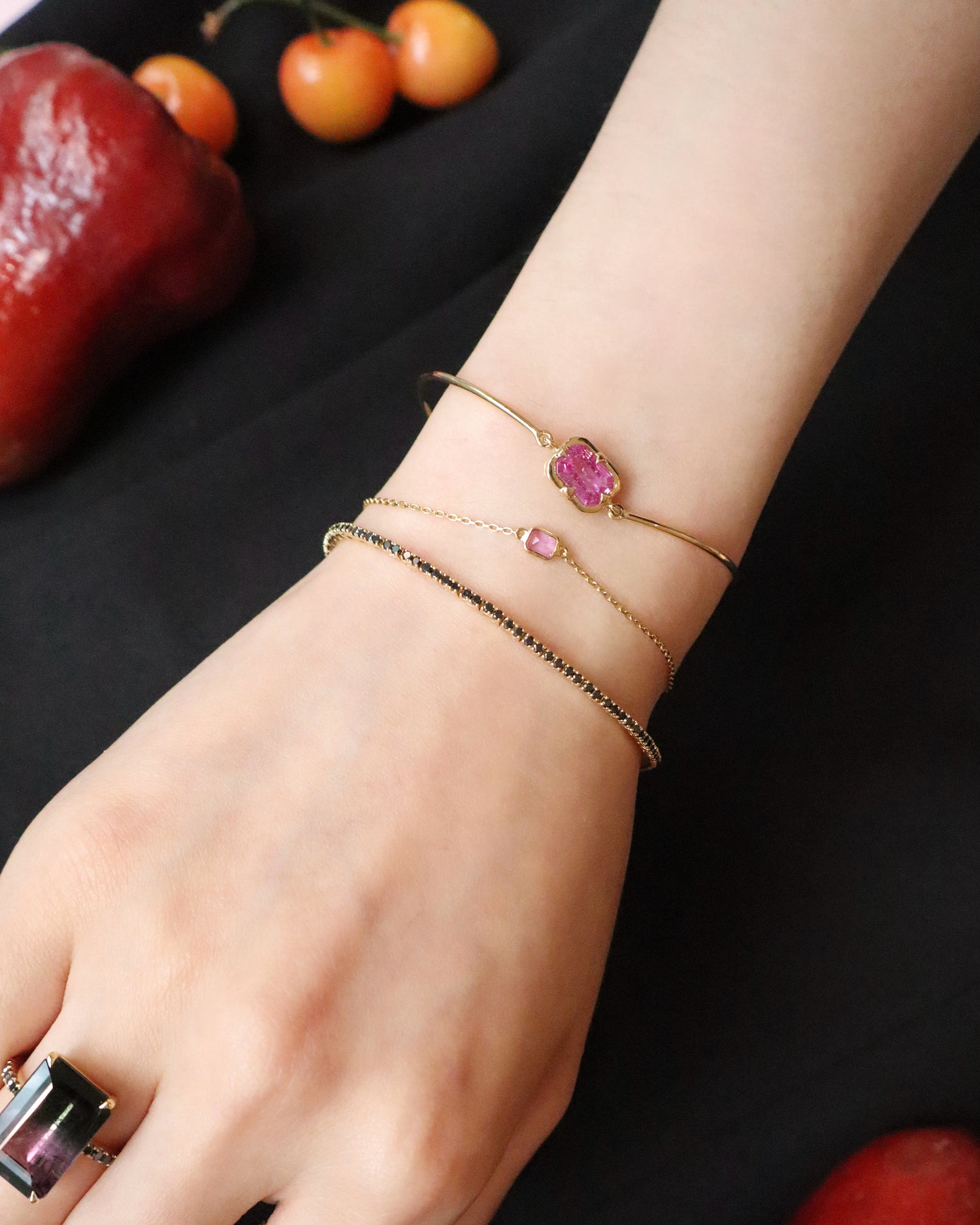 Pink_Sapphire_Compass_Bangle_18K_gold_stackable_design_on_model_3