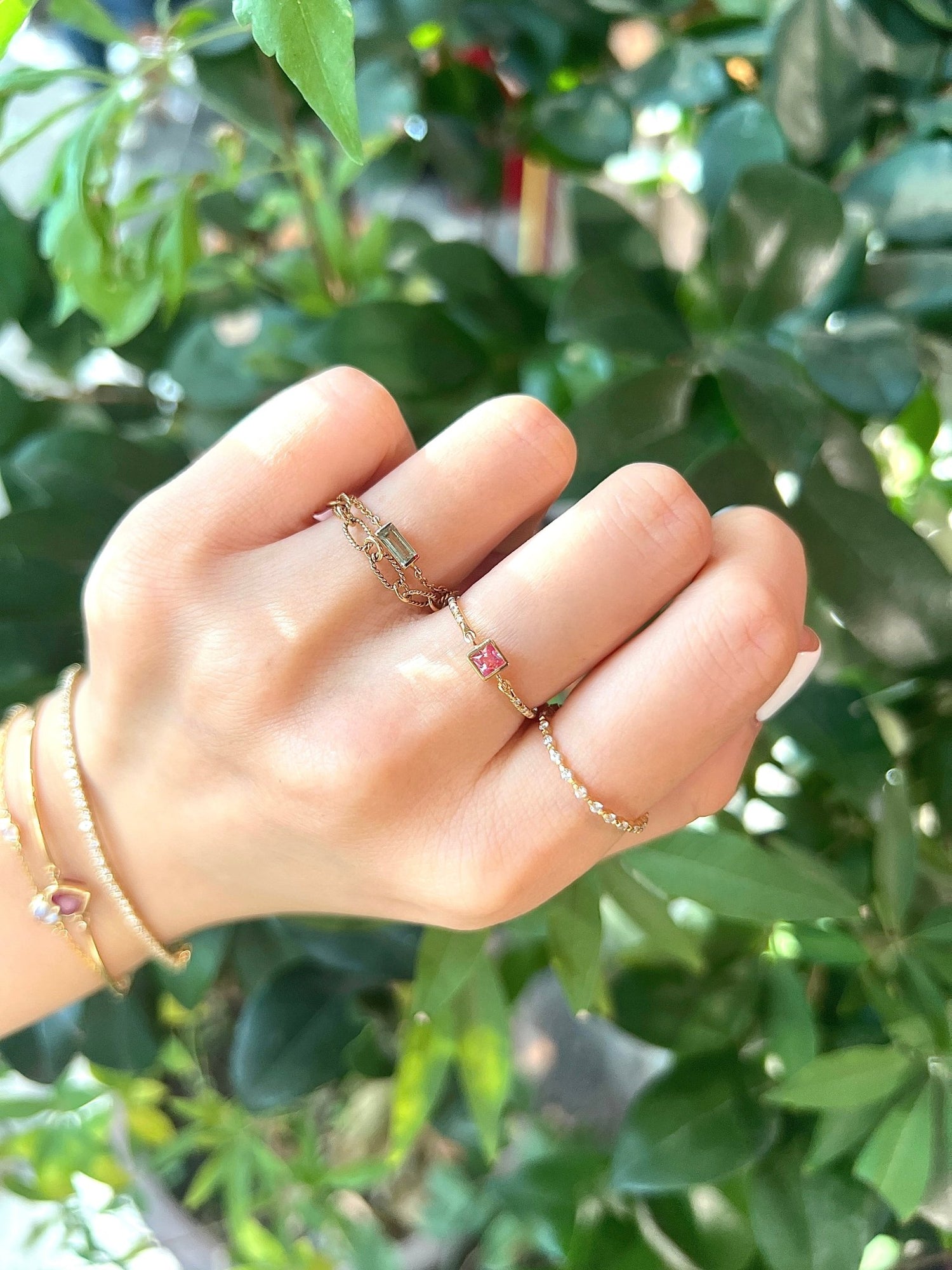 Pink Sapphire Petite Circle Diamond Ring 18k gold Stackable ring on hand