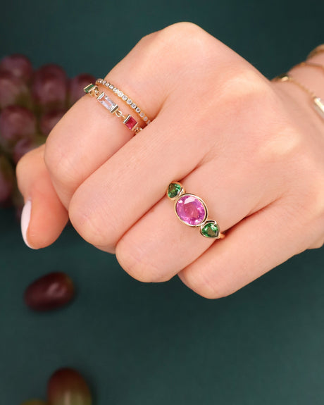 Pink_Sapphire_Tsavorite_Ring_18K_gold_engagement_ring_on_model_1