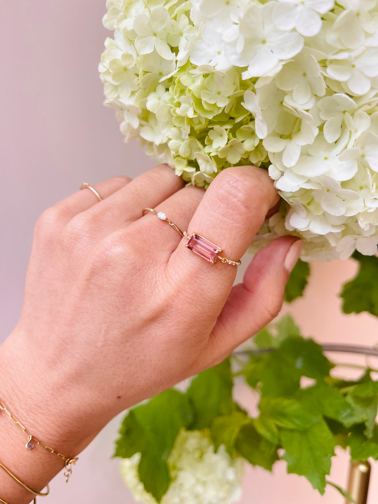 Pink Tourmaline Petite Circle Diamond Ring 18k gold stackable ring on model 2