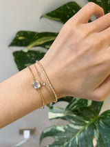 Rainbow Moonstone Bar Bangle 18k gold stackable design on model