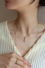 Rainbow Moonstone & Diamond Arrow Pendant Necklace 18K gold handmade fine jewelry on model 1